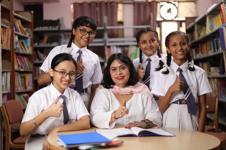 Happy school students girl child learning, teacher teaching, extra classes, group study, doubt session, educational practice, thumbs up